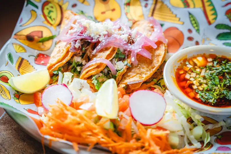 Quesabirria tacos and consome